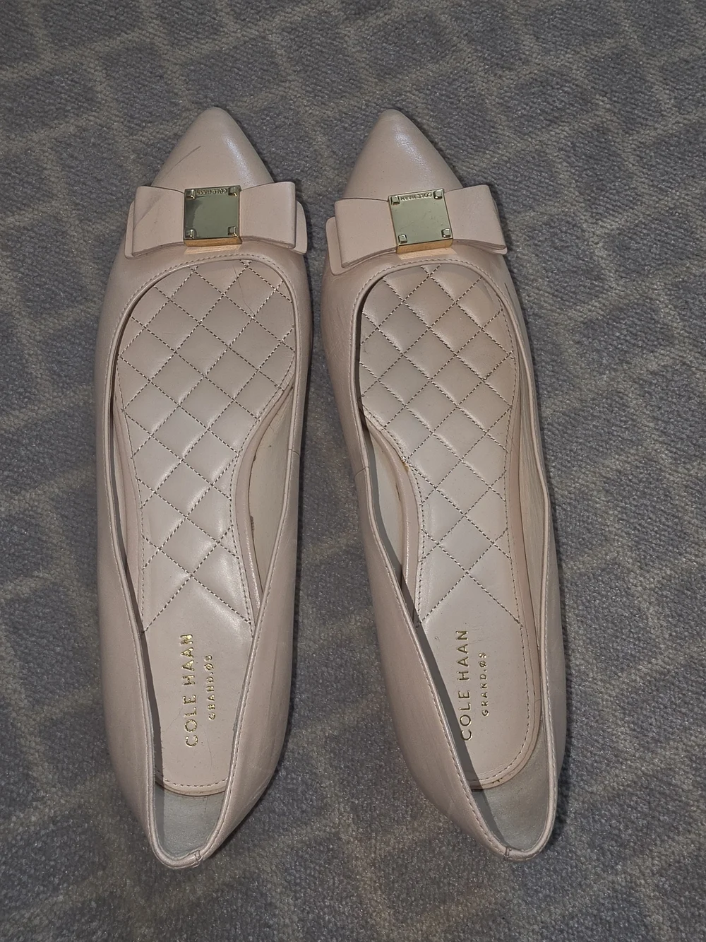 Cole Haan Beige Pointed-Toe Ballet Flats with Bow & Gold Plaque